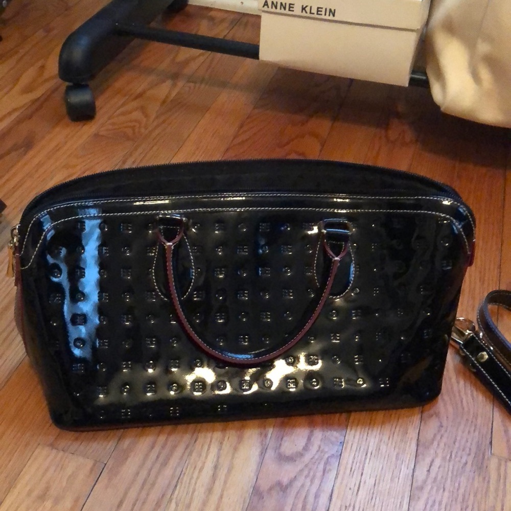 Like new Arcadia hand bag with strap.